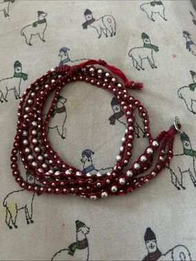 Silver and cord wrap bracelet